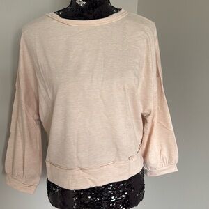 Long sleeve tan top with back out size M
Never used